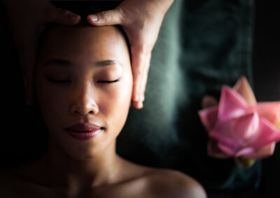 Indulge in head massage for your well being, lotus flower
